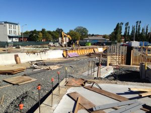 Outbound barrier wall and curbs